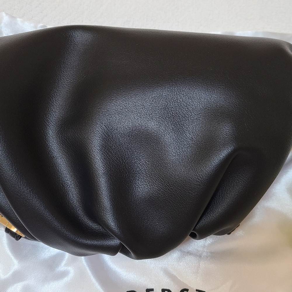 Understated black leather Handbag/clutch
